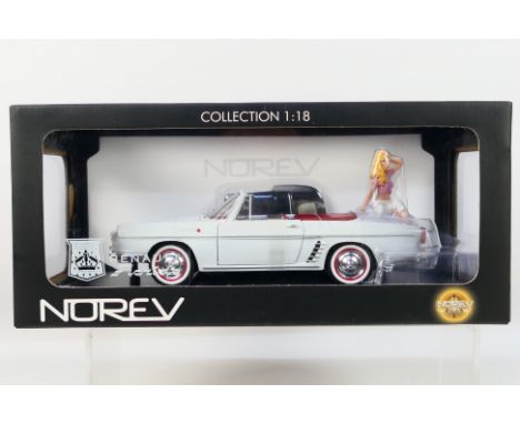 Norev - A boxed 1:18 scale Norev #185180 Renault Floride with Brigitte Bardot figure. The model in white appears to be in Min