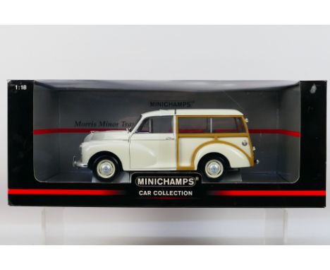 Minichamps - A boxed Minichamps 'Car Collection' #150137010 1:18 scale Morris Minor Traveller. The model in white appears to 