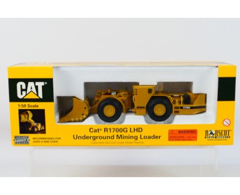 Norscot - An unopened 1:50 scale CAT R1700G LHD underground mining loader # 55140. The model appears Mint in a Very Good box 