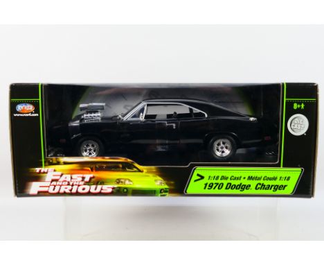 Joyride - A boxed Joyride #36973 1:18 scale 'The Fast & The Furious' 1970 Dodge Charger. The model appears to be in Mint cond