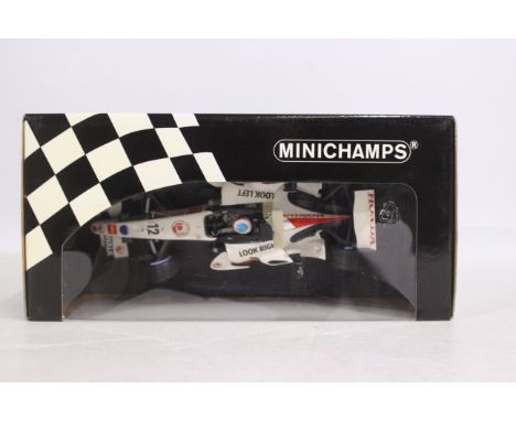 Minichamps - A 1:18 scale Honda Racing Team 2006 Jensen Button RA106 F1 car # 100 060012. The model appears Mint in a Very Go