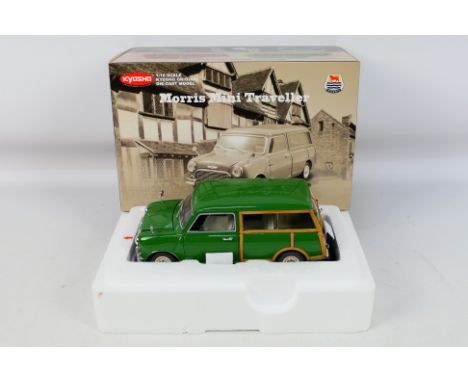 Kyosho - A boxed 1:18 scale Kyosho #08195G Morris Mini Traveller. The model in green appears to be in Mint condition, housed 