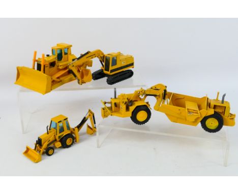 NZG - A group of unboxed 1:50 scale CAT construction vehicles, a 428 back hoe loader # 285, a 215 Hydraulic excavator # 190, 