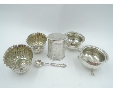 A pair of silver salts of cauldron form having moulded rims (1 spoon), Birmingham 1905, William Aitkin, a pair of Victorian s