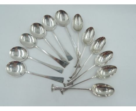 A set of six Art Deco style coffee spoons of plain form, Birmingham 1927, maker WHC, and a set of six Victorian silver coffee