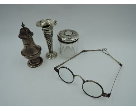 A pair of Georgian silver spectacles, Birmingham, maker SP, a glass dressing table pot with HM silver lid, HM silver pepperet