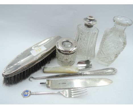 A small selection of HM silver including two dressing table pots with HM silver collars/lids, silver backed brush, button hoo