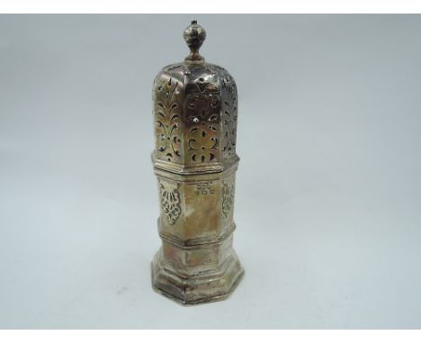 A silver sugar caster of light house form having applique and pierced decoration, Birmingham 1931, Hukin &amp; Heath, approx 