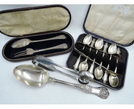 A selection of HM silver including a cased set of six silver teaspoons with a matching pair of sugar nips, a silver table spo