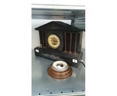 A late 19th century marble cased architectural cased mantle clock together with a small oak cased barometer.