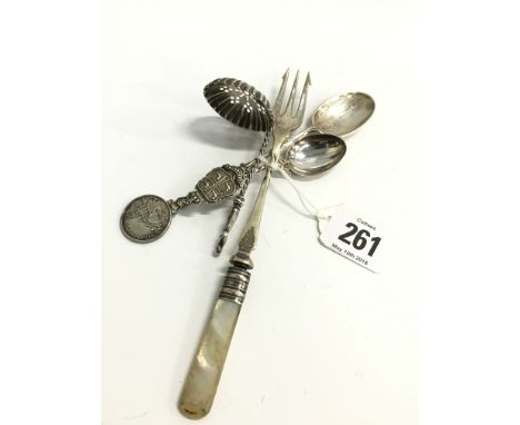 A silver sugar sifter with an Apostle tip together with a silver teaspoon, one other and a pickle fork.