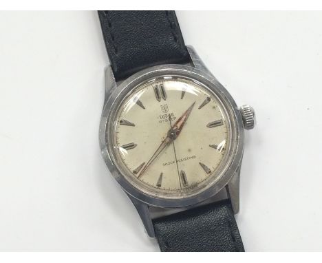 A Gentleman's Tudor Oyster (Rolex) shock resistant manual wind wristwatch, original crown, No 22590/4453 on non original blac