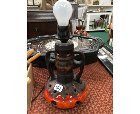 A West German high fired table lamp with two handles.