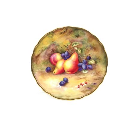 A Royal Worcester hand painted china plate by (H) Price, decorated with fruit with gilt border, painted and printed marks to 