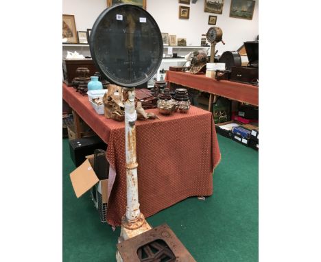 W. & T. Avery & Sons Limited of Birmingham set of heavy iron scales, 20st x 0.5lbs, resting on a cast iron pedestal, wheels, 