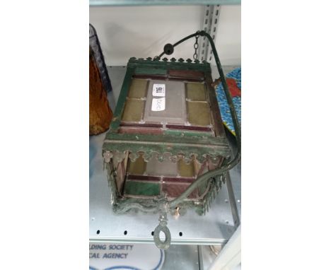 A late 19th century leaded glass metal framed hall lantern (minor crack to one panel).