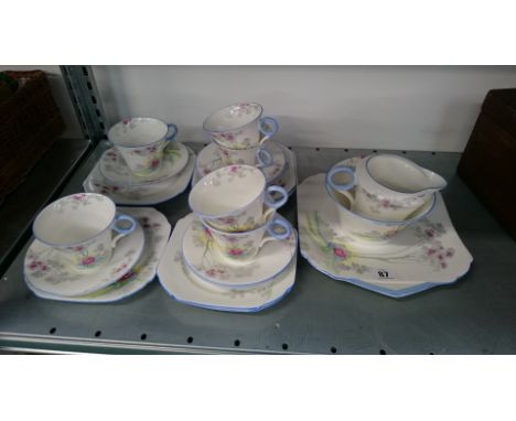 A Shelley Queen Anne bone china teaset, 'Garden Archway', complete for six, comprising six teacups, saucers and side plates, 