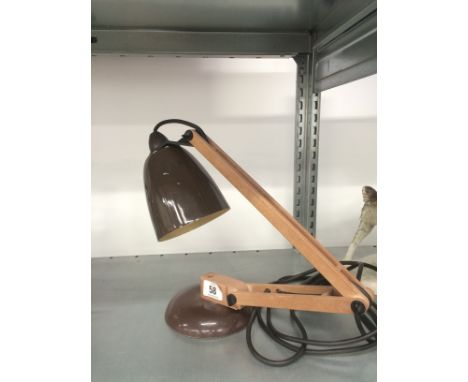 A mid 20th century Terence Conran 'style' Mac lamp with brown painted shade