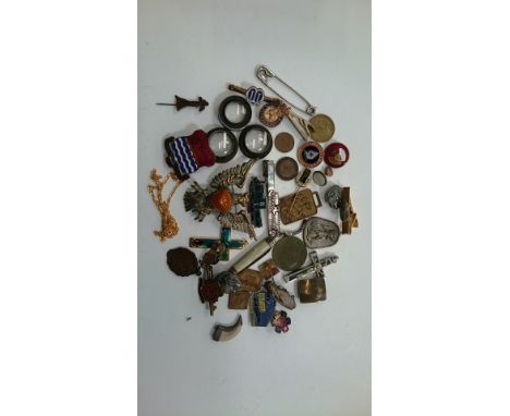 A small box containing enamelled badges, pins, pen knife, tie clips etc.