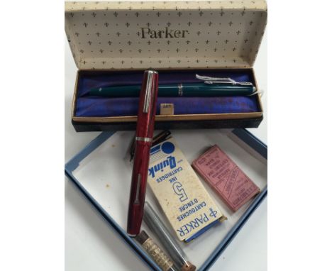 A vintage Parker 45 fountain pen together with a burgundy pearl Esterbrook pen and some spare pencil leads.