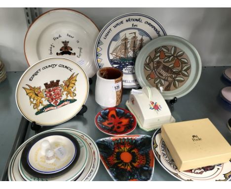 A Poole Pottery butter dish and cover decorated with a green dot together with a Port of Southampton Poole plate, two Delft W