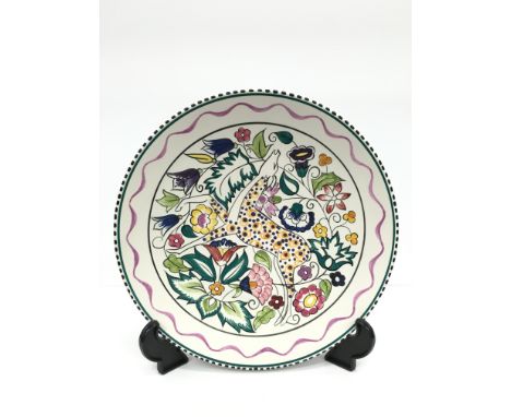 A Poole Pottery earthenware traditional dish, painted in the SK Persian Deer design by Susan Russell (10 inches diameter).