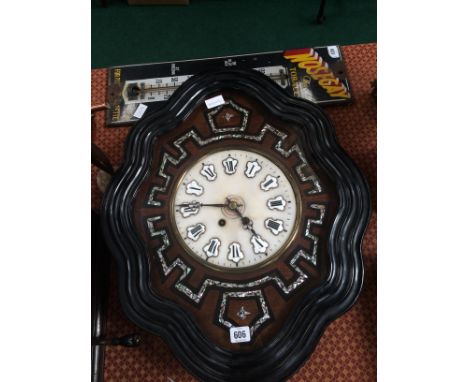 A Louis Philippe design black bordered wall clock, decorated with mother of pearl alabaster face, enamel dial, black hands.