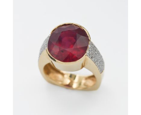 An 18ct yellow gold ruby? And diamond, size N.