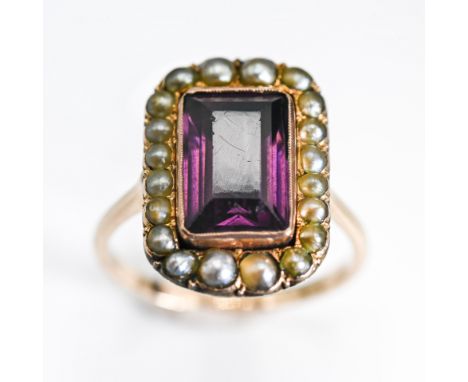 A rose gold Georgian amethyst &amp; seed pearl ring, the central rectangular cut amethyst, measuring approx. 11mm x 7mm, surr