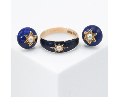 An antique 15ct yellow gold ring with blue enamelling &amp; a central star design set with a seed pearl, 3.43gm, size M 1/2 t