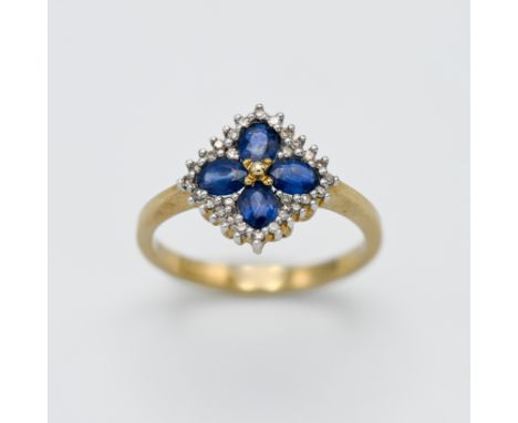 A 9ct yellow gold diamond and sapphire 'Flower' style ring, size M.