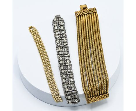 A good quality costume jewellery multi-strand gold tone bracelet by Butler &amp; Wilson, an 18ct gold plated multi-link brace
