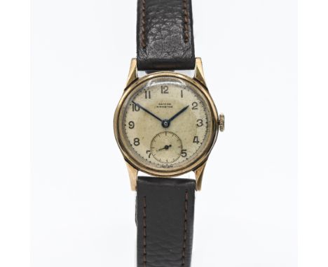 Gaydon Kingston, a 9ct yellow gold cased vintage gent's wristwatch on a brown leather strap.