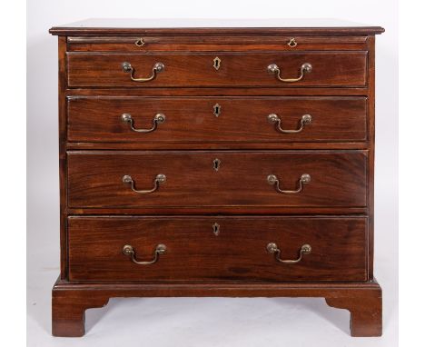 A George II mahogany bachelor's chest of drawers, mid 18th century; the top with moulded edges, above a brushing slide and fo