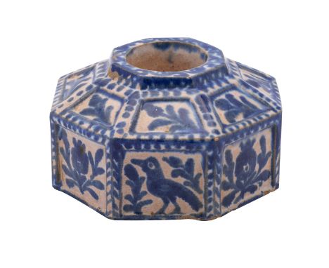 A Spanish Talavera blue and white faience octagonal inkwell painted with panels of birds and floral sprays, probably 18th cen