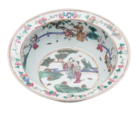 A Chinese famille rose basin with everted rim, the interior painted with figures in garden landscapes, flowering sprays and b
