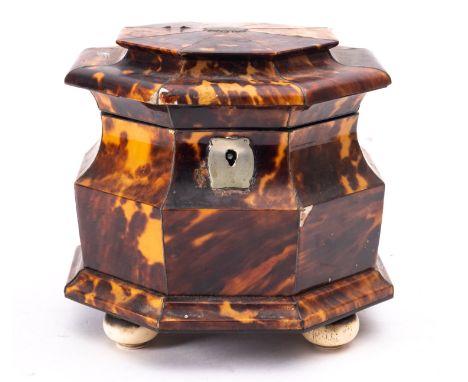 A tortoiseshell and pewter strung tea caddy, second quarter 19th century; of octagonal section, with hinged cover above the w
