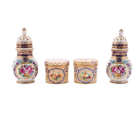A pair of small Copeland and Garrett porcelain cylindrical boxes and covers and a pair of Continental pounce pots and screw c