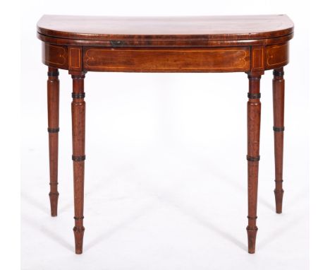 A Regency mahogany and line inlaid card table, early 19th century; of 'D' section, the hinged top with later baize interior; 