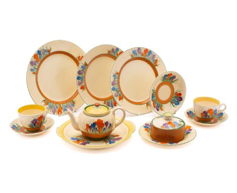 A group of Clarice Cliff Autumn Crocus pottery, comprising teapot and cover, two cups, three saucers, preserve pot, cover and