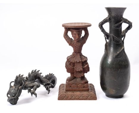 A Japanese bronze vase, a bronze dragon mount (one leg lacking) and a Thai carved wood stand with acrobat figure support, 30,