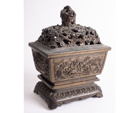 A Chinese bronze censer, cover and stand cast in relief with dragons, phoenix and mythical beasts, apocryphal six-character X