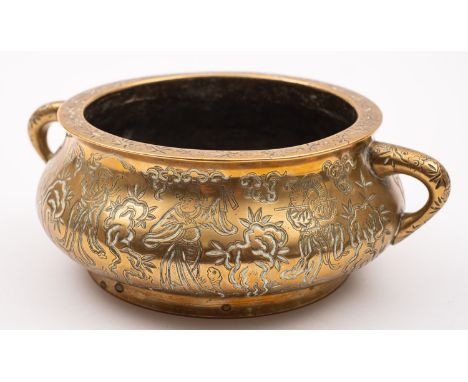 A Chinese polished bronze censer of compressed form with loop handles, cast and engraved with the Eight Immortals, rockwork, 