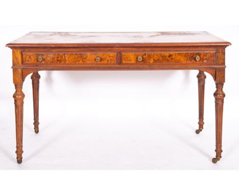 A Victorian walnut side table, late 19th century; (previously a dressing table with superstructures); with moulded edges abov