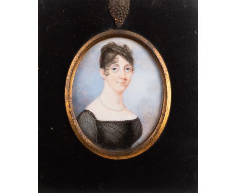 British School, 19th Century -Portrait miniature of a lady in a white dress and blacknegligee, wearing decorative hair pin -W