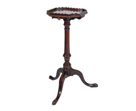 A fine late George II or early George III mahogany kettle stand, circa 1760; the square top with canted corners and  wavy gal