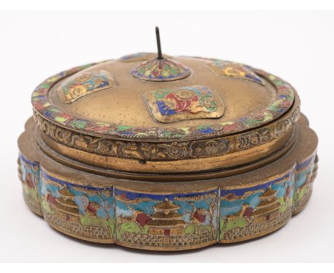 A Chinese brass and enamel bowl and cover decorated with panels of pagoda landscapes, flowers and foliage, with blue glass li