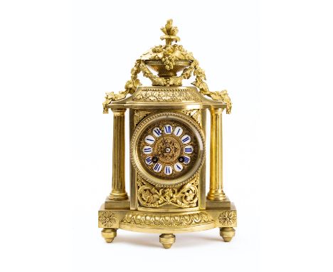A French mantel clock the eight-day duration movement striking the hours and half-hours on a bell with an outside countwheel,