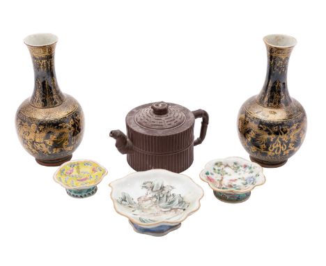 A mixed lot of Chinese ceramics comprising a pair of gilt decorated black ground 'Dragon' bottle vases, apocryphal iron-red s