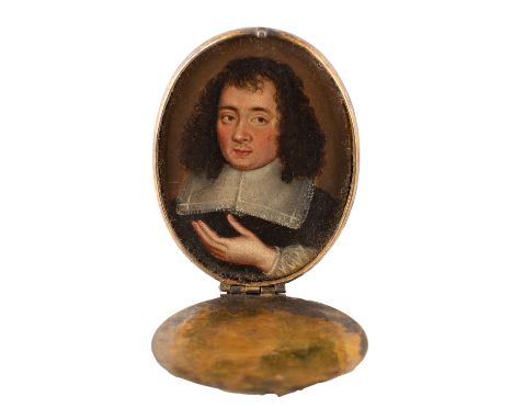 British/Dutch School, 18th Century -A miniature portrait of a Clergyman -Oil on copper -6 x 4.5cm (oval) -in a brass hinged  